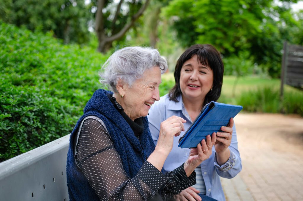 On tablet in the park