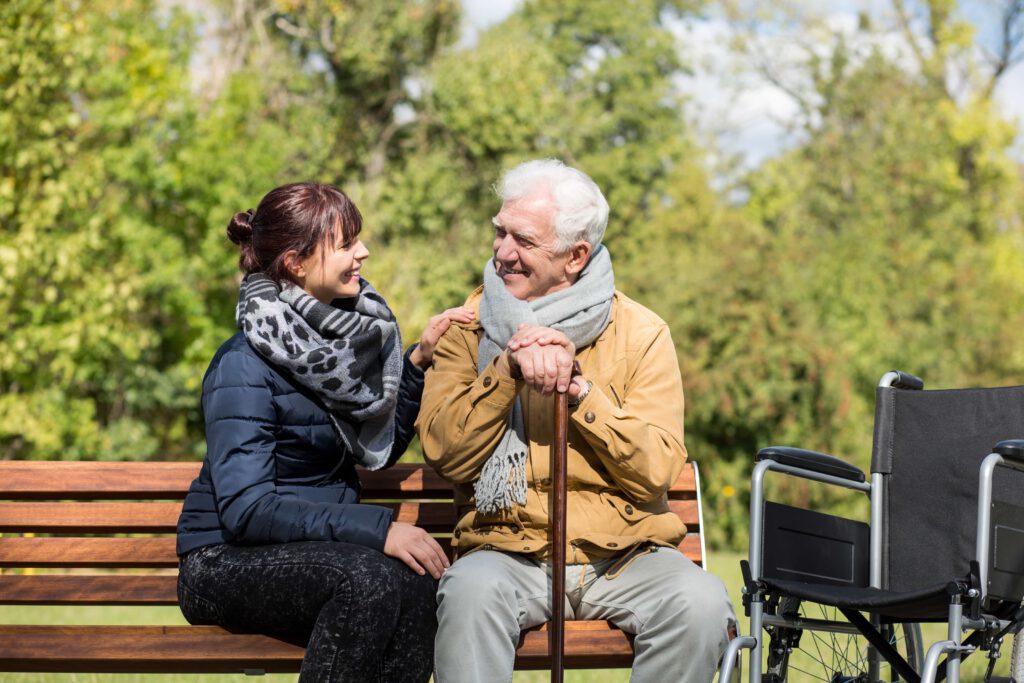 Smiling conversation in park