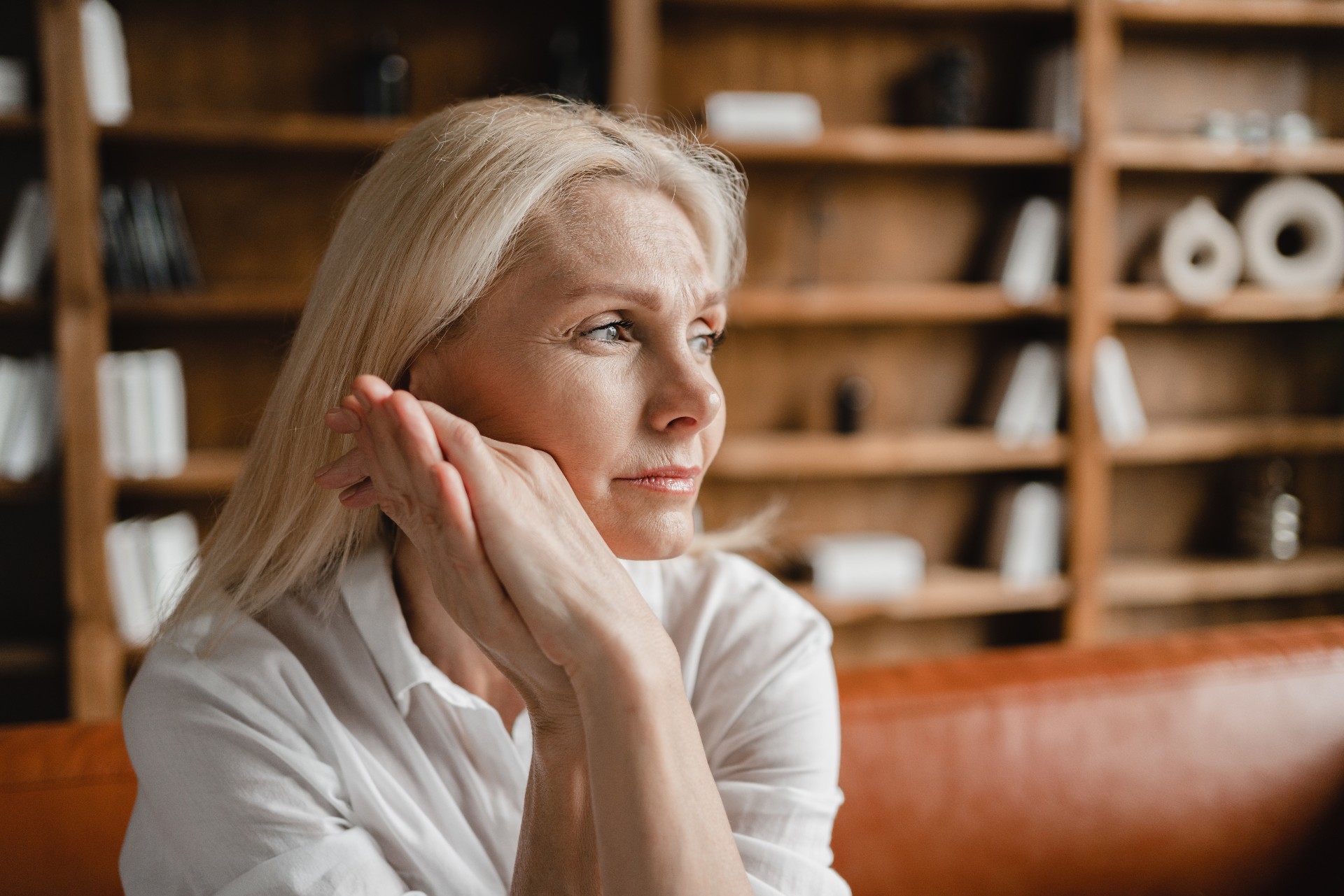 woman looking into the distance looking tired